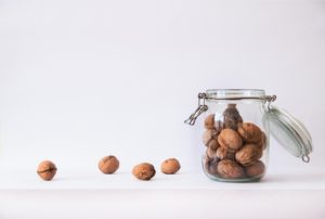 Website home design: jar with walnuts