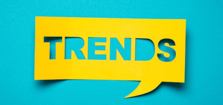 Gelbe Sprechblase mit "Trends" auf türkisem Hintergrund
