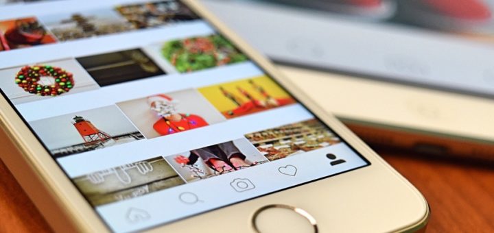 Handy mit Instagram App im Explore Feed