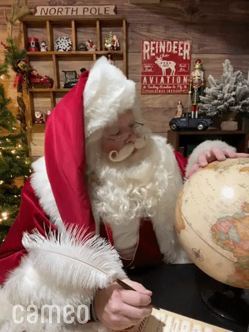 Weihnachtsmann mit Globus